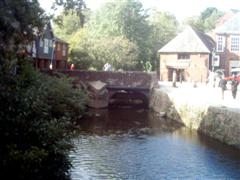 Old quayside bridge spanning the leat